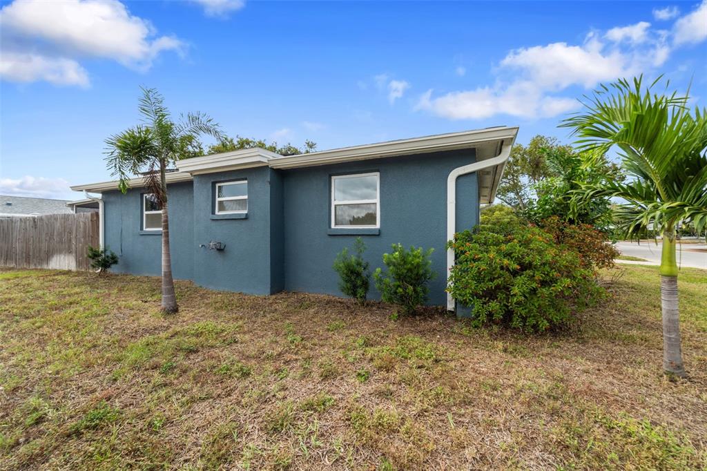 4238 Glissade Drive New Port Richey, FL 34652 - Photo 50 of 62 a house with a yard