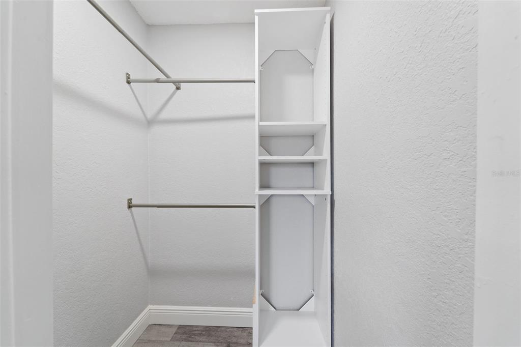 4238 Glissade Drive New Port Richey, FL 34652 - Photo 60 of 62 a view of small space with racks on the wall