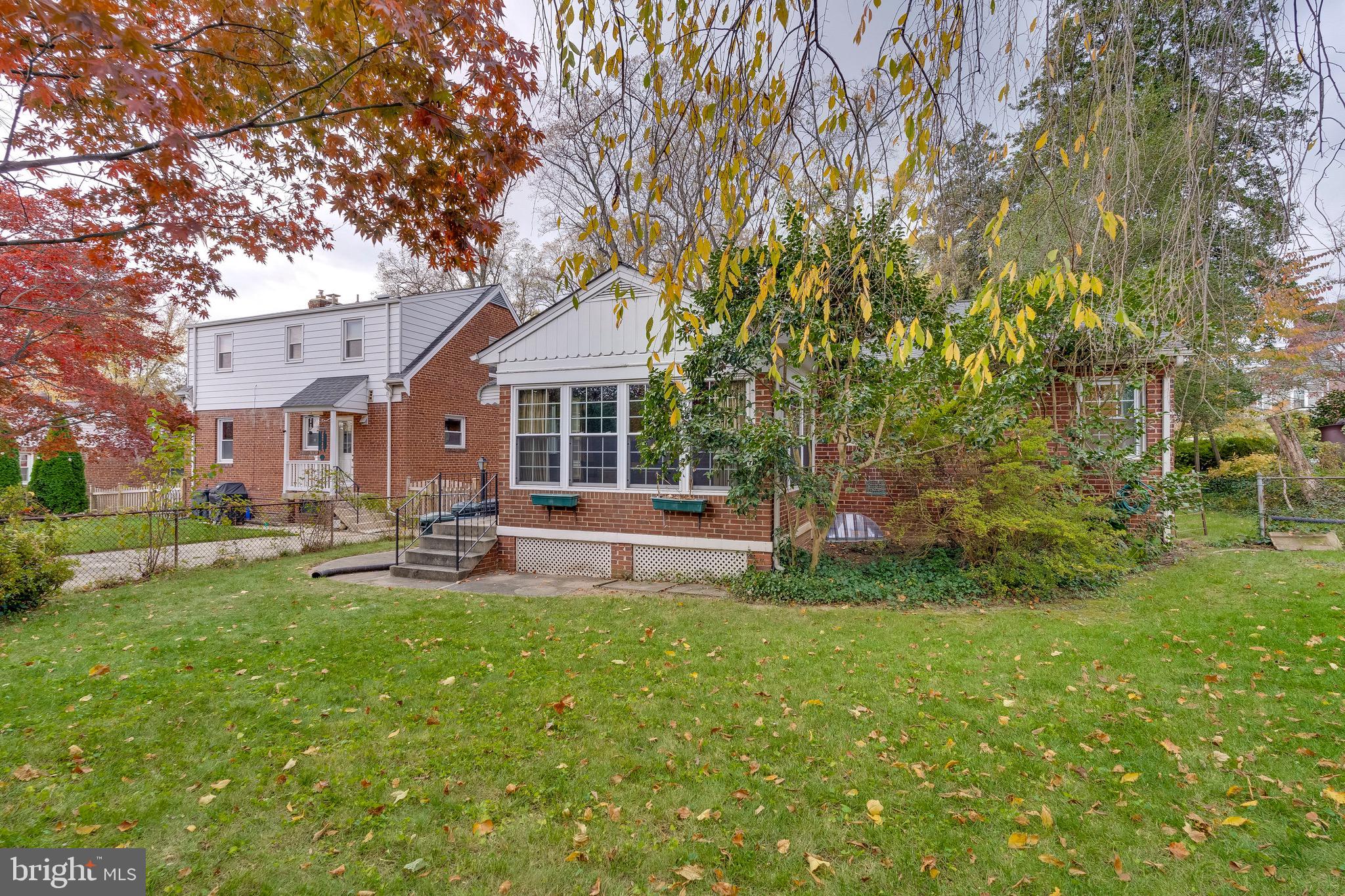 10001 Portland Road Silver Spring, MD 20901 - Photo 6 of 42 Sunroom on back of house