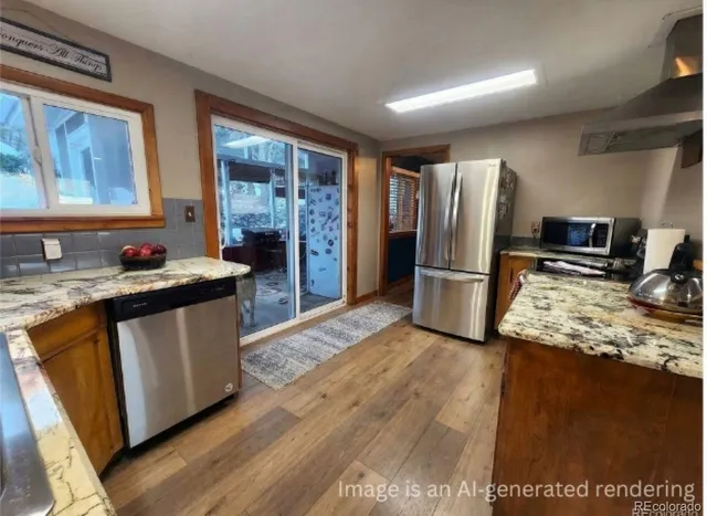 a kitchen with stainless steel appliances granite countertop table chairs sink and cabinets