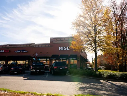 a view of a building with a garden