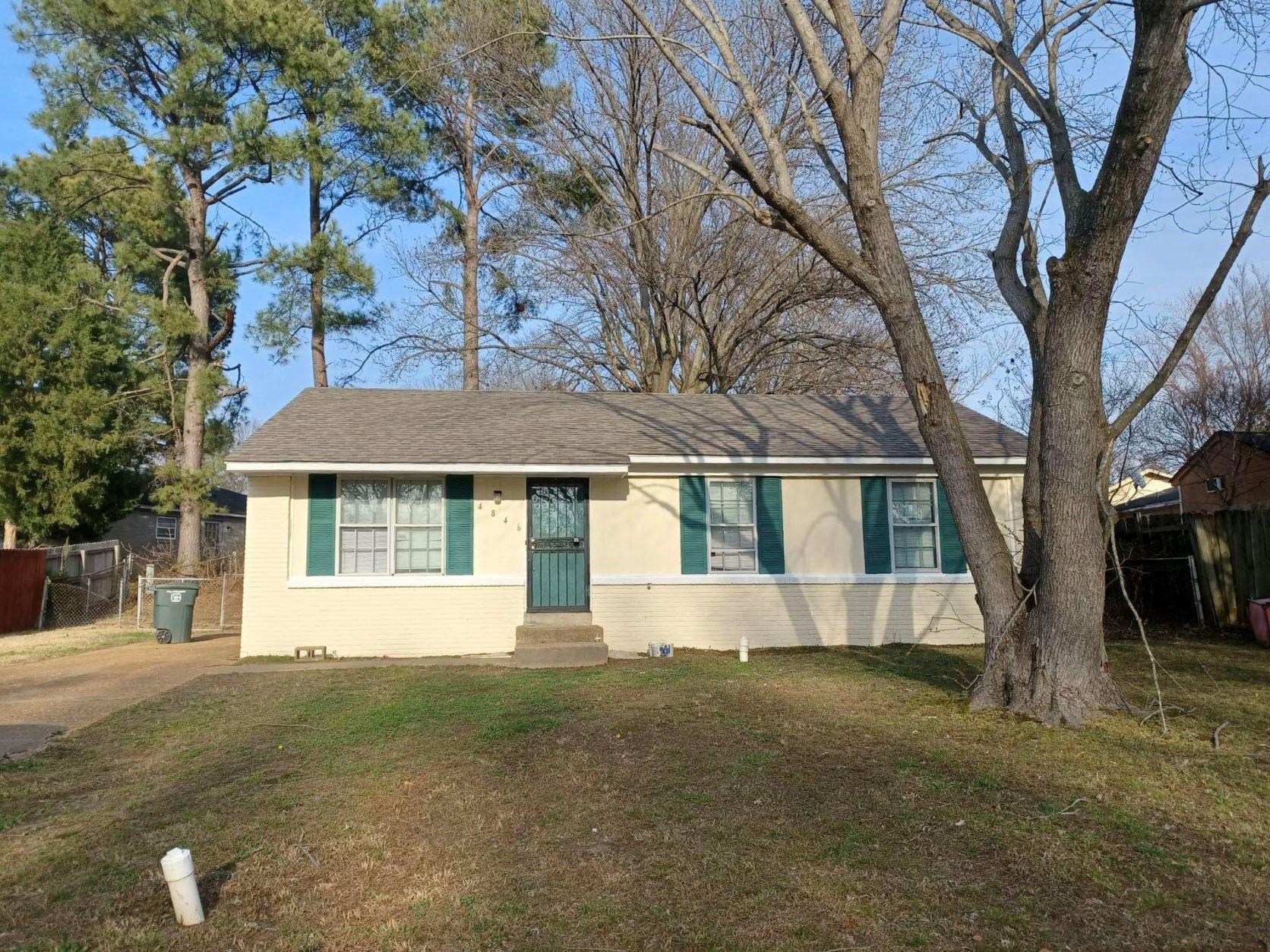 4846 Appleville Street Memphis, TN 38109 - Photo 1 of 1 a front view of a house with a yard