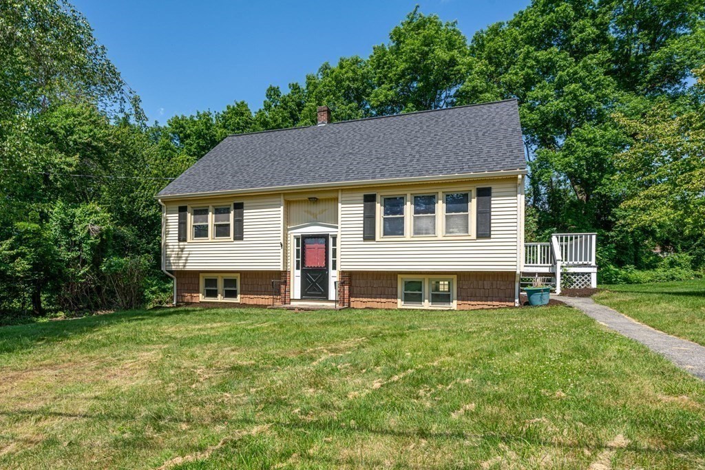 6 Coleman Road Groveland, MA 01834 - Photo 25 of 39 a front view of a house with a yard
