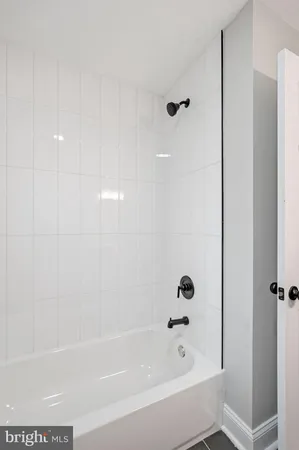 a bathroom with a bathtub