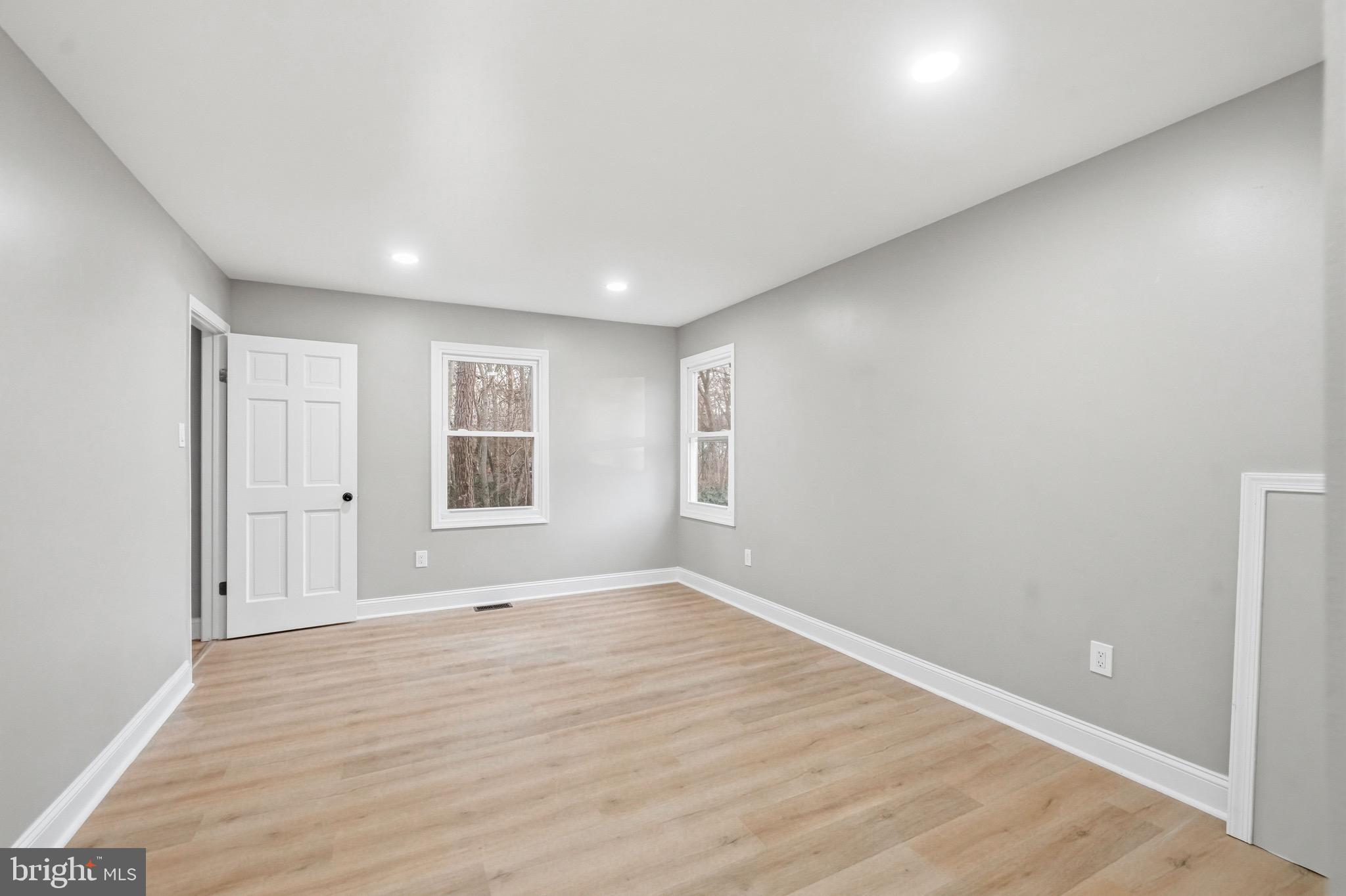 18 Waltham Drive Tabernacle, NJ 08088 - Photo 33 of 43 wooden floor in an empty room with a window