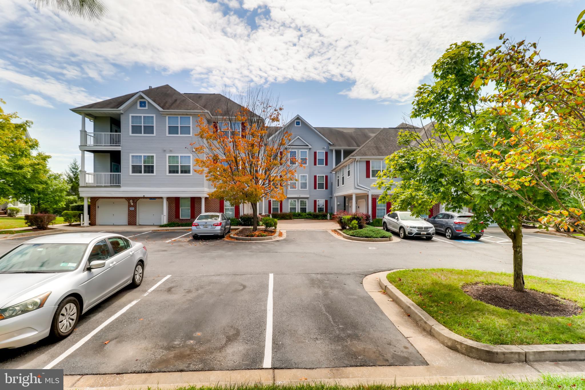 25 Hawk Rise Lane, Unit 303 Owings Mills, MD 21117 - Photo 22 of 27 Exterior from the parking lot