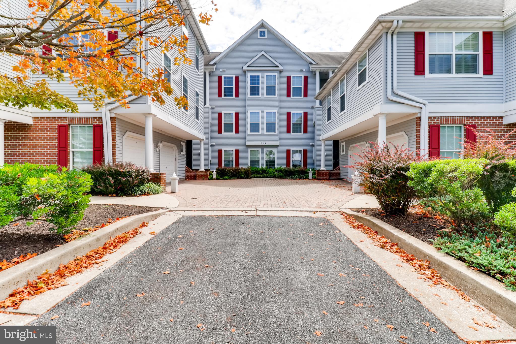 25 Hawk Rise Lane, Unit 303 Owings Mills, MD 21117 - Photo 23 of 27 Exterior front from the parking lot