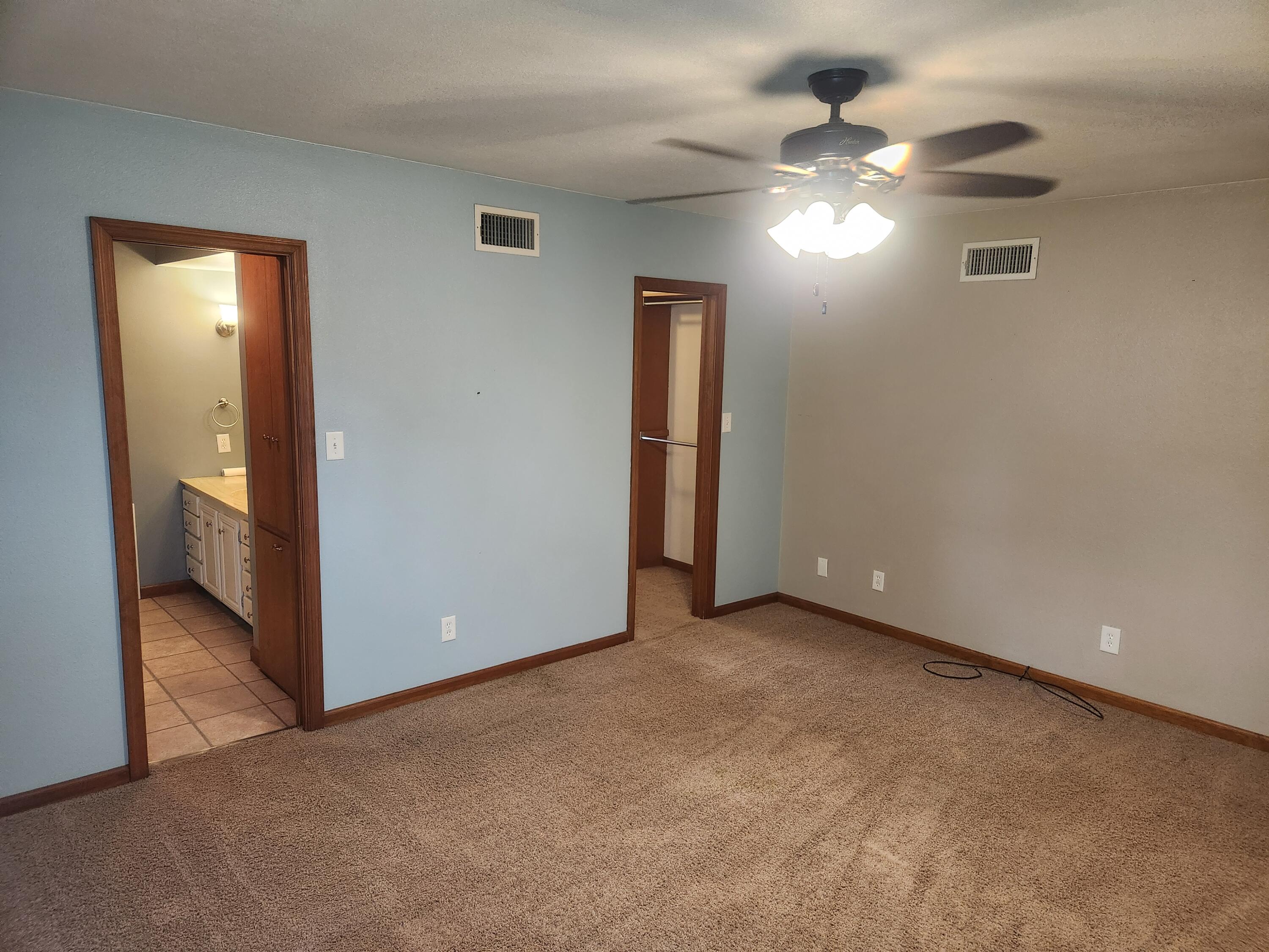 4726 Locksley Drive East Rensselaer, IN 47978 - Photo 28 of 33 an empty room with chandelier fan