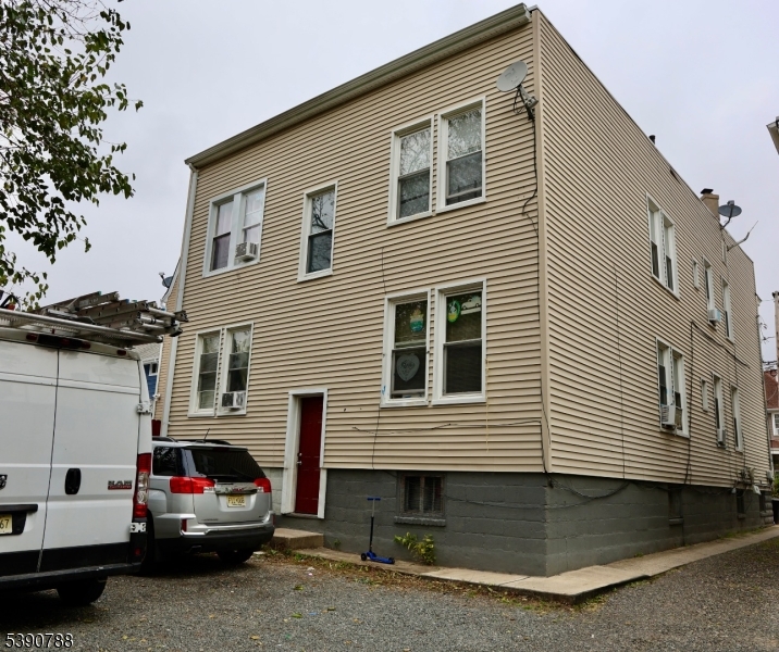 92 Riggs Place West Orange, NJ 07052 - Photo 2 of 2 a view of a car park in front of house