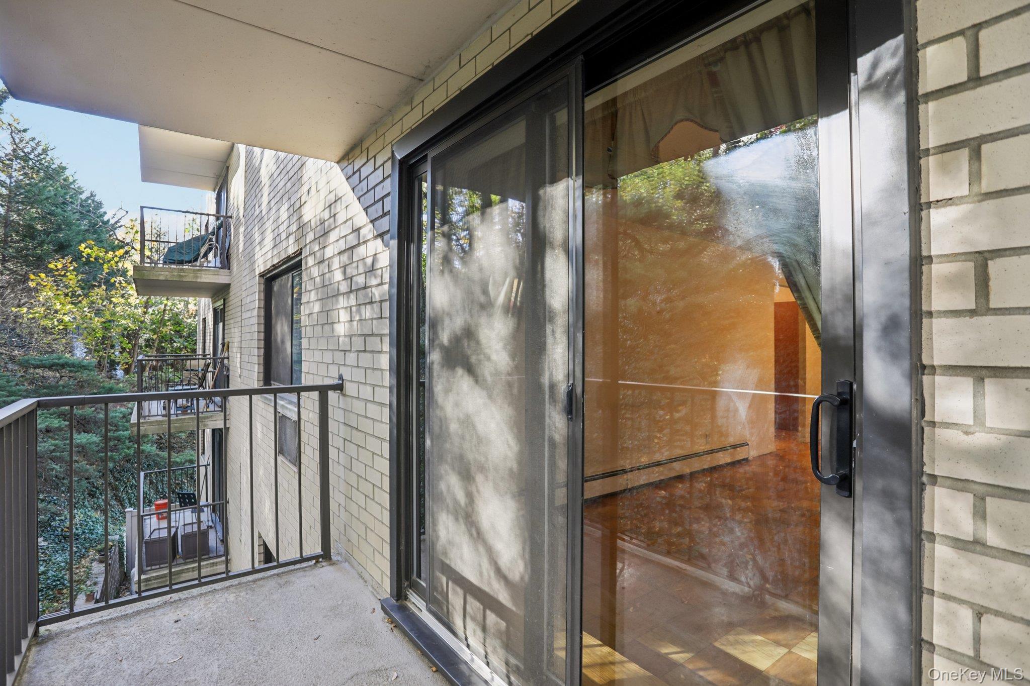108 Sagamore Road, Unit 3E Tuckahoe, NY 10707 - Photo 28 of 30 a view of a glass door with a glass door