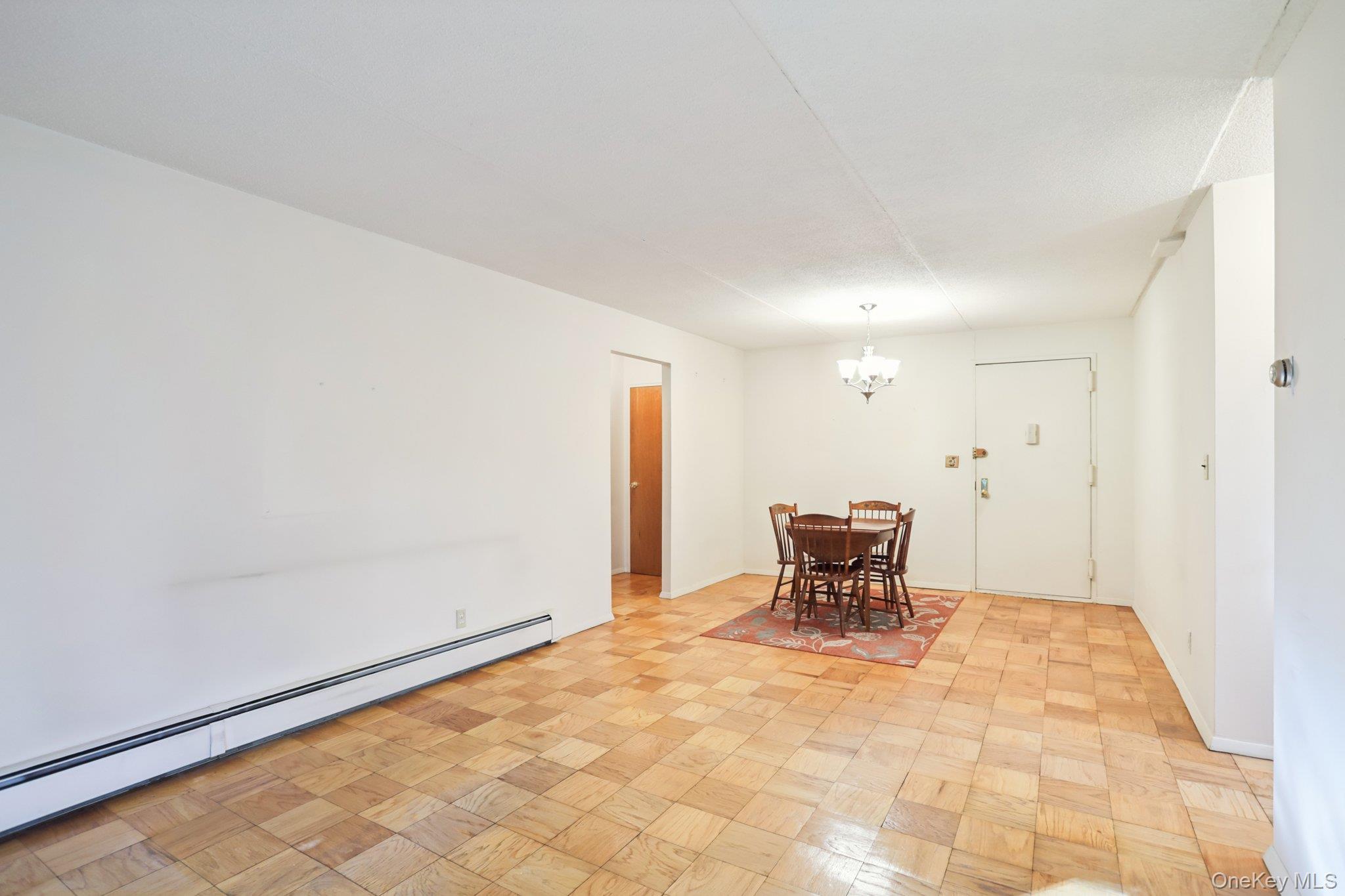 108 Sagamore Road, Unit 3E Tuckahoe, NY 10707 - Photo 6 of 30 a view of a livingroom with chairs