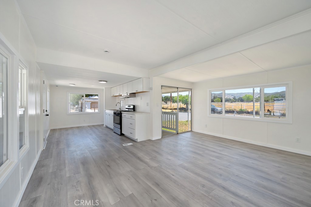 26455 Paradise Valley Road, Unit 86 Warner Springs, CA 92086 - Photo 15 of 34 wooden floor in an empty room with a window