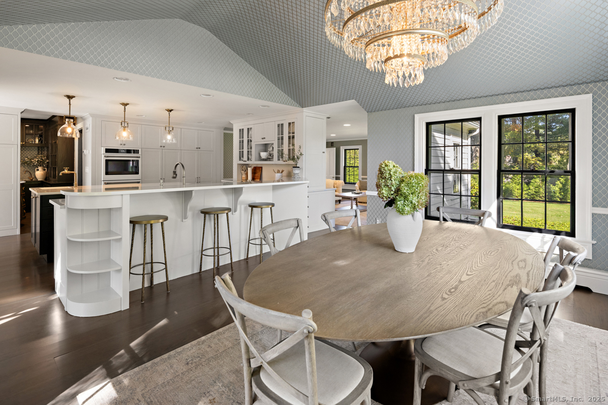 469 Brookside Road New Canaan, CT 06840 - Photo 16 of 40 a view of a dining room with furniture window and outside view