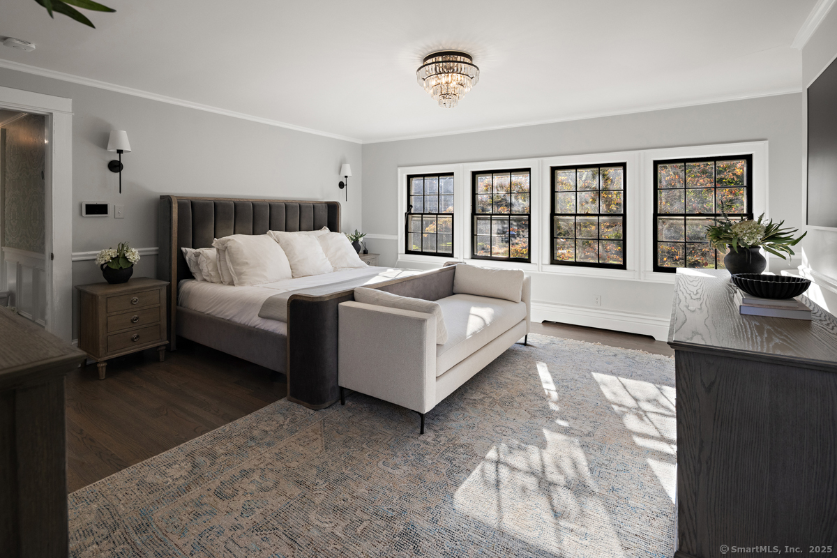 469 Brookside Road New Canaan, CT 06840 - Photo 20 of 40 a living room with furniture and a large window