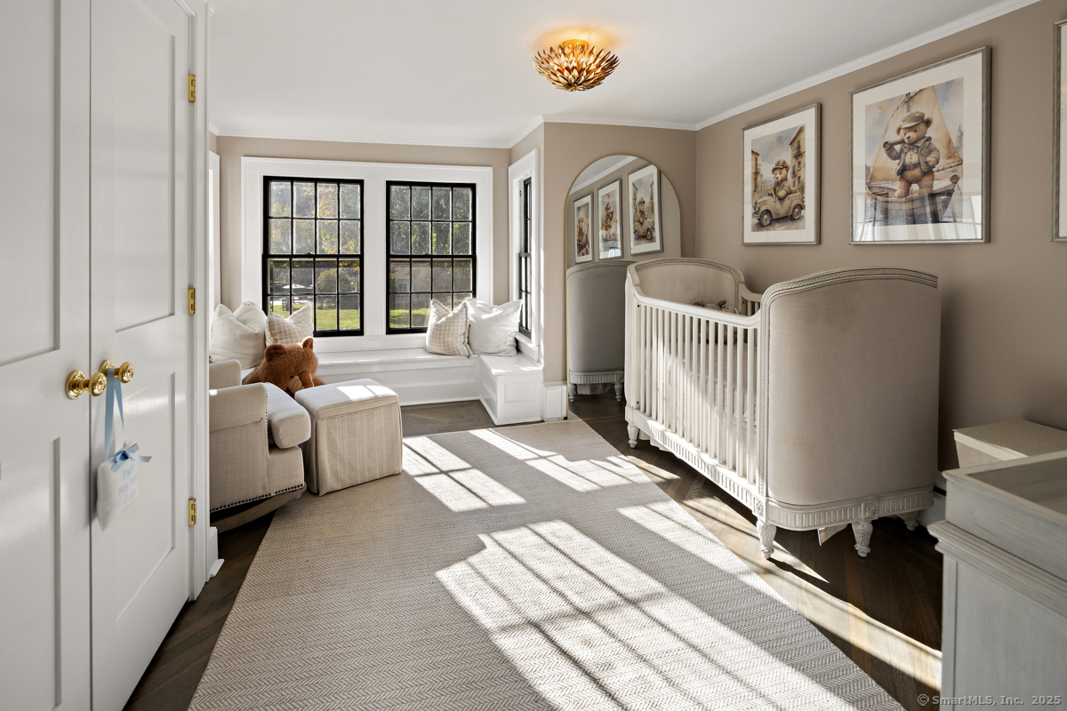 469 Brookside Road New Canaan, CT 06840 - Photo 23 of 40 a living room with furniture and a window