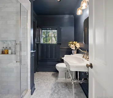 a view of a house with backyard and garden