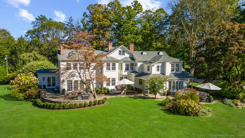 a view of a back yard and patio