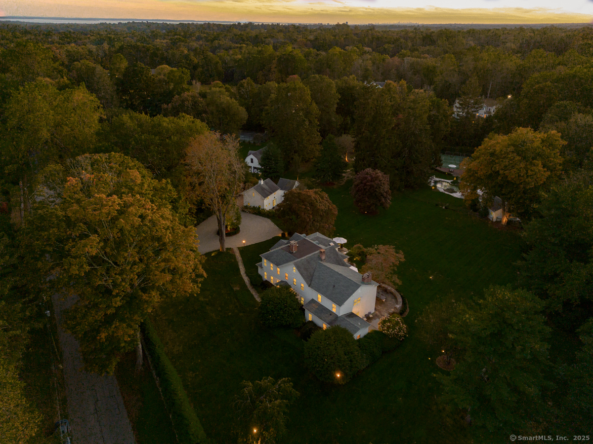 469 Brookside Road New Canaan, CT 06840 - Photo 40 of 40 a view of a house with a yard
