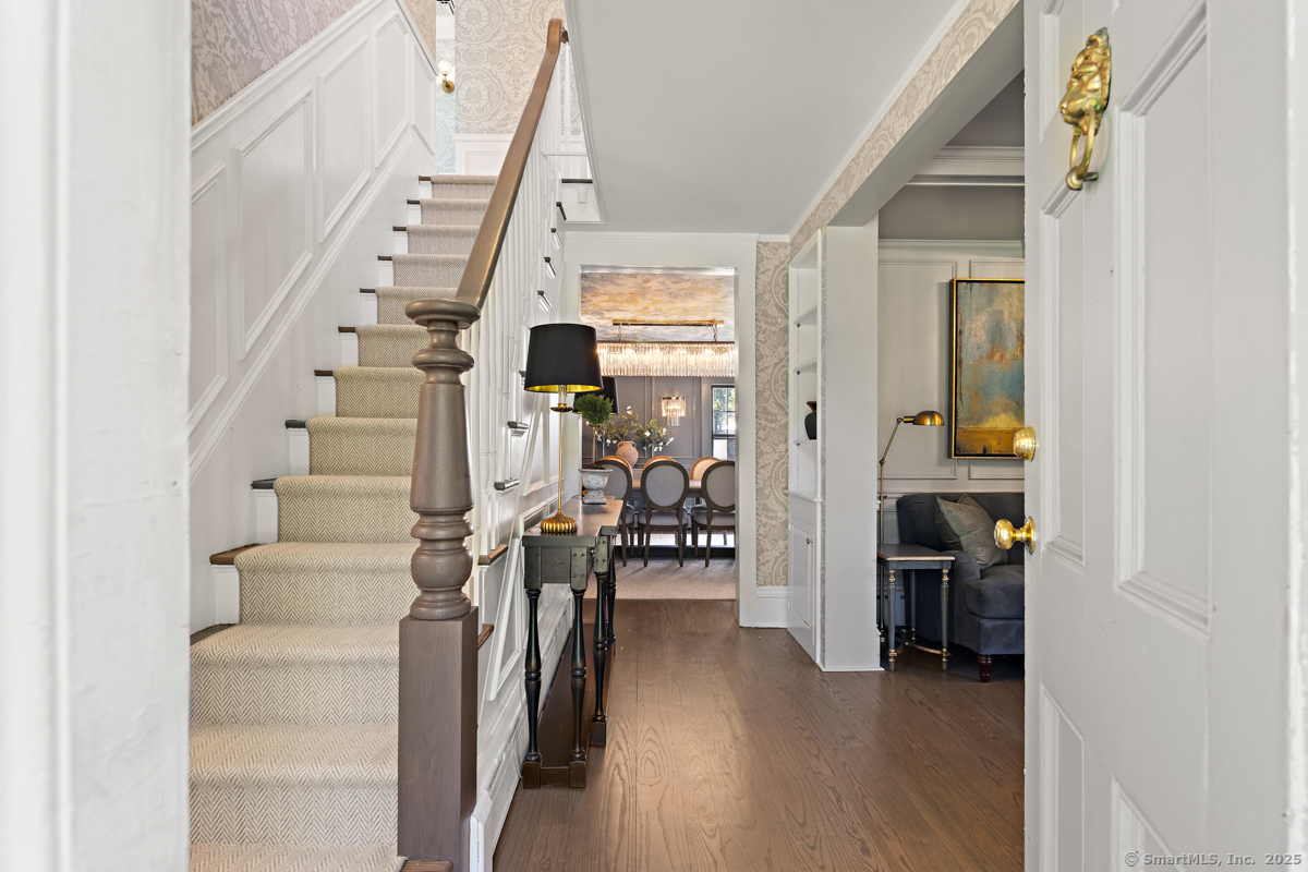 469 Brookside Road New Canaan, CT 06840 - Photo 4 of 40 a view of entryway and hall with wooden floor