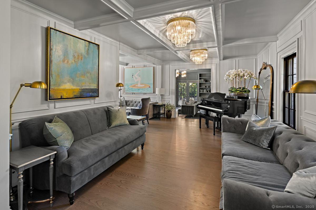 469 Brookside Road New Canaan, CT 06840 - Photo 5 of 40 a living room with fireplace furniture and a large window