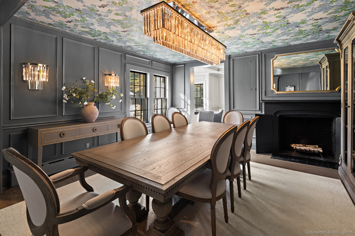 469 Brookside Road New Canaan, CT 06840 - Photo 10 of 40 a view of a dining room with furniture and chandelier