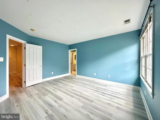 a bathroom with a sink mirror toilet and bathtub