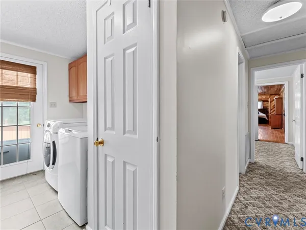a kitchen with stainless steel appliances granite countertop a refrigerator and a cabinets