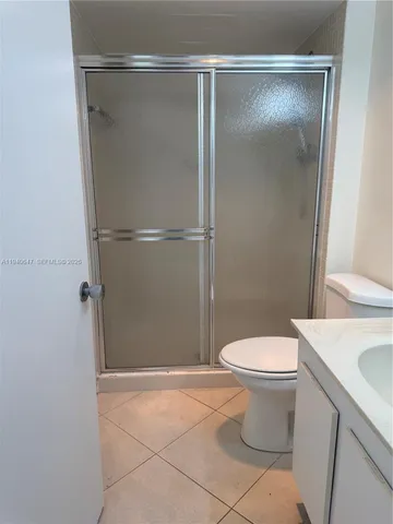 a view of swimming pool with outdoor seating and yard in back