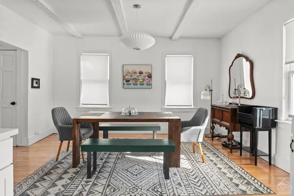 a view of a dining room with furniture