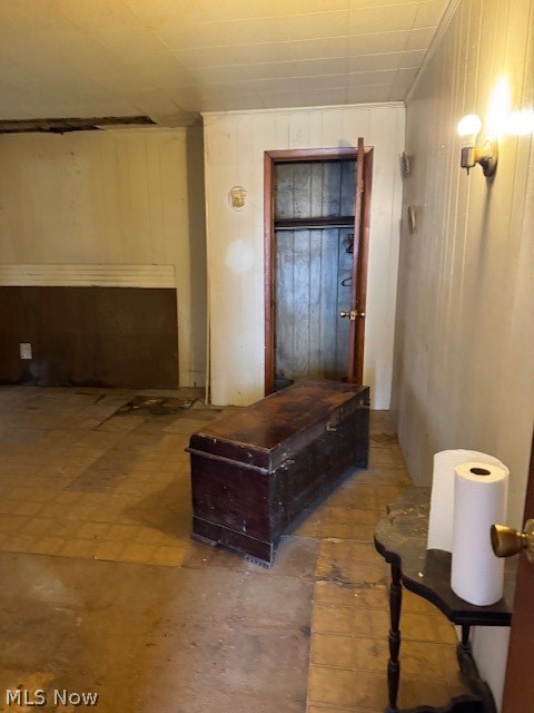 626 High Street Wellsburg, WV 26070 - Photo 14 of 18 Corridor featuring wooden walls and tile patterned floors