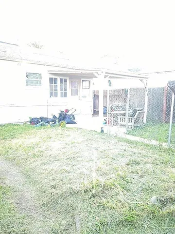 a view of a storage and utility room with washer and dryer