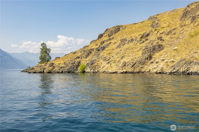 a view of mountain with lake