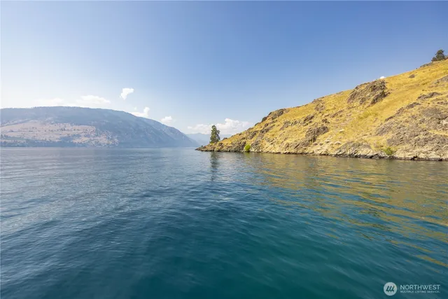 a view of empty room and mountains