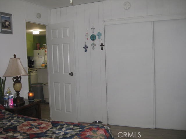 701 Montara Road, Unit 243 Barstow, CA 92311 - Photo 15 of 15 a bedroom with a bed and a dresser