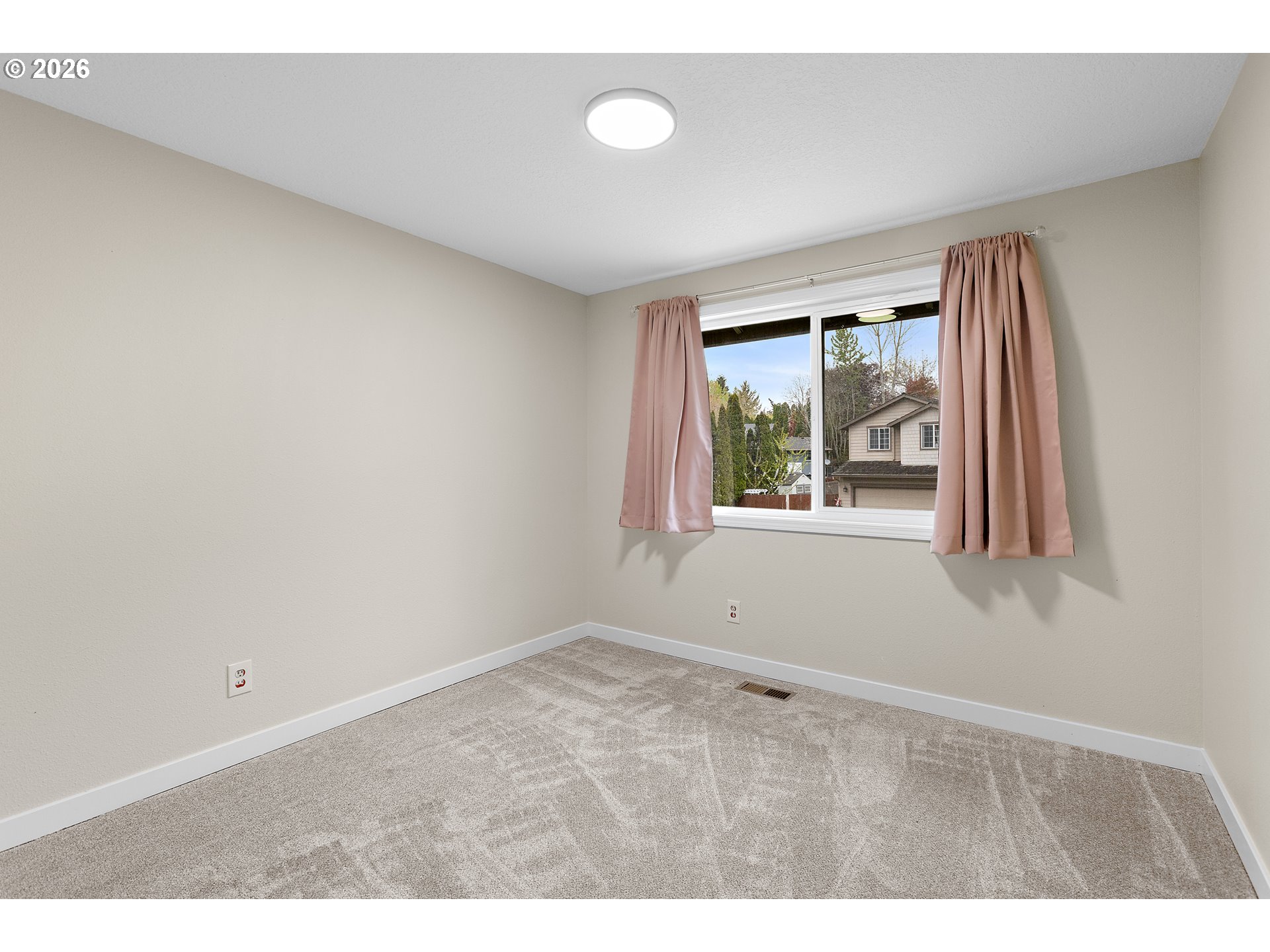 1472 Southwest 14th Street Gresham, OR 97080 - Photo 18 of 40 a view of an empty room with a window