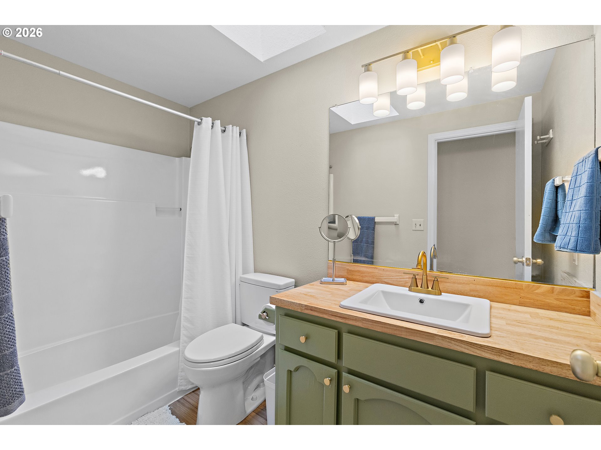 1472 Southwest 14th Street Gresham, OR 97080 - Photo 20 of 40 a bathroom with a sink a toilet and shower