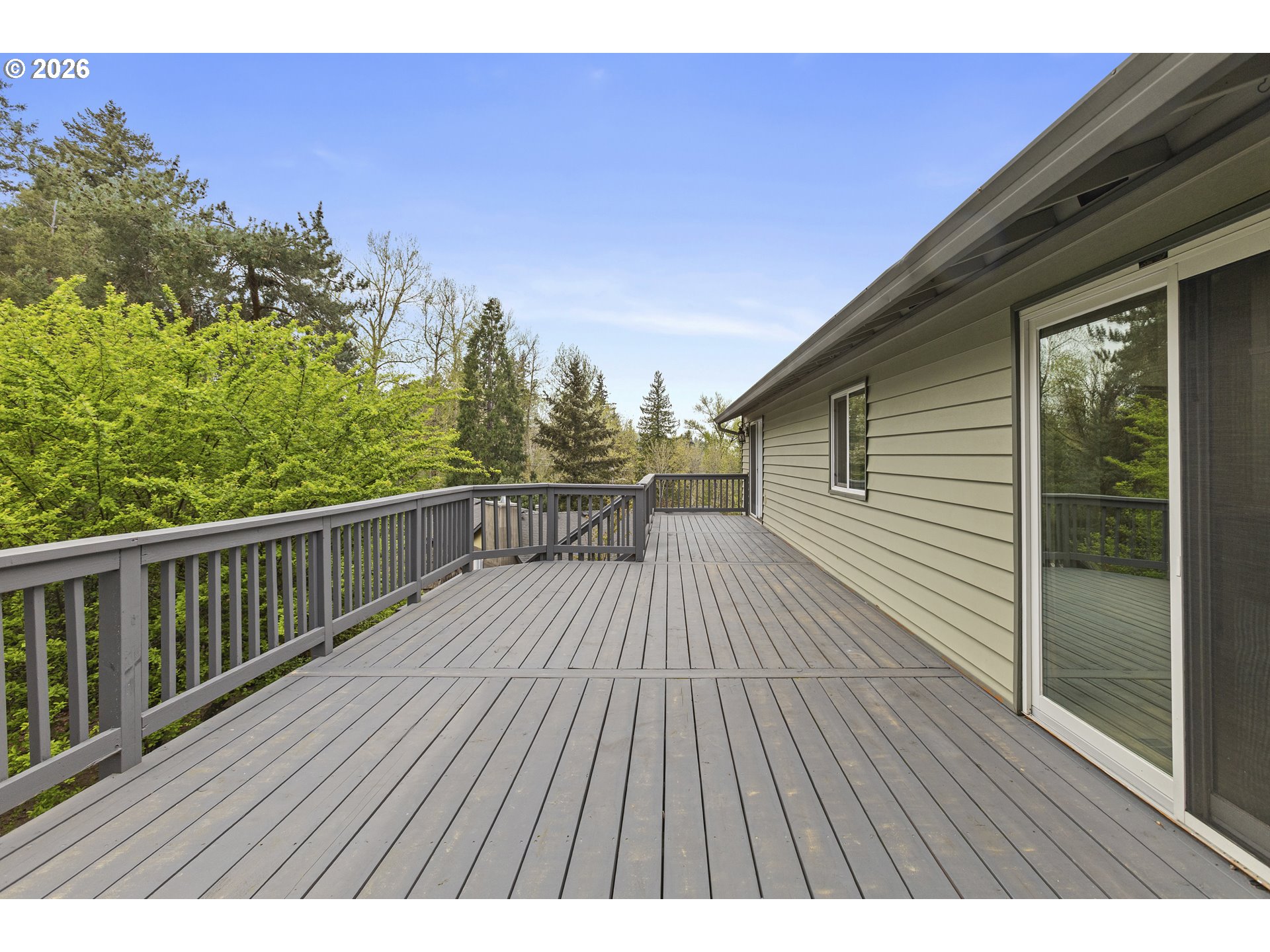 1472 Southwest 14th Street Gresham, OR 97080 - Photo 29 of 40 a view of balcony with wooden floor and fence