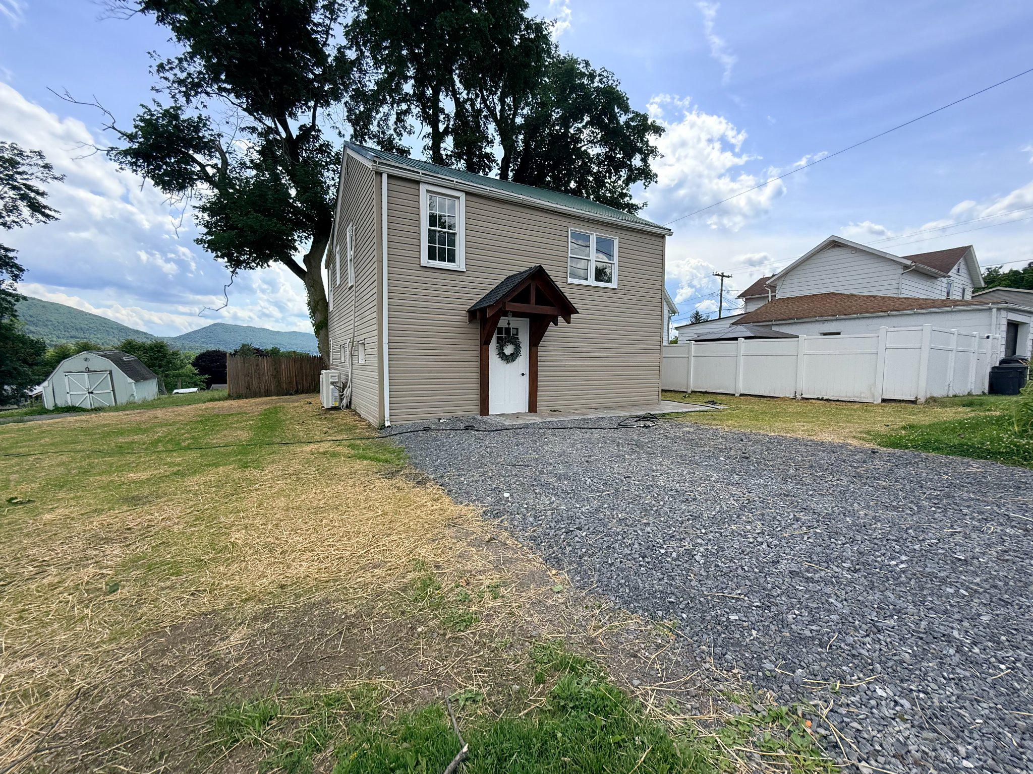 385 Herr Street Lock Haven, PA 17745 - Photo 21 of 21 Home exterior, hardscaping, and gravel driveway
