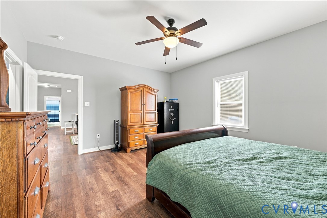 8718 Rock Cedar Road New Kent, VA 23124 - Photo 24 of 43 Wood-finish flooring, light gray walls, white trim