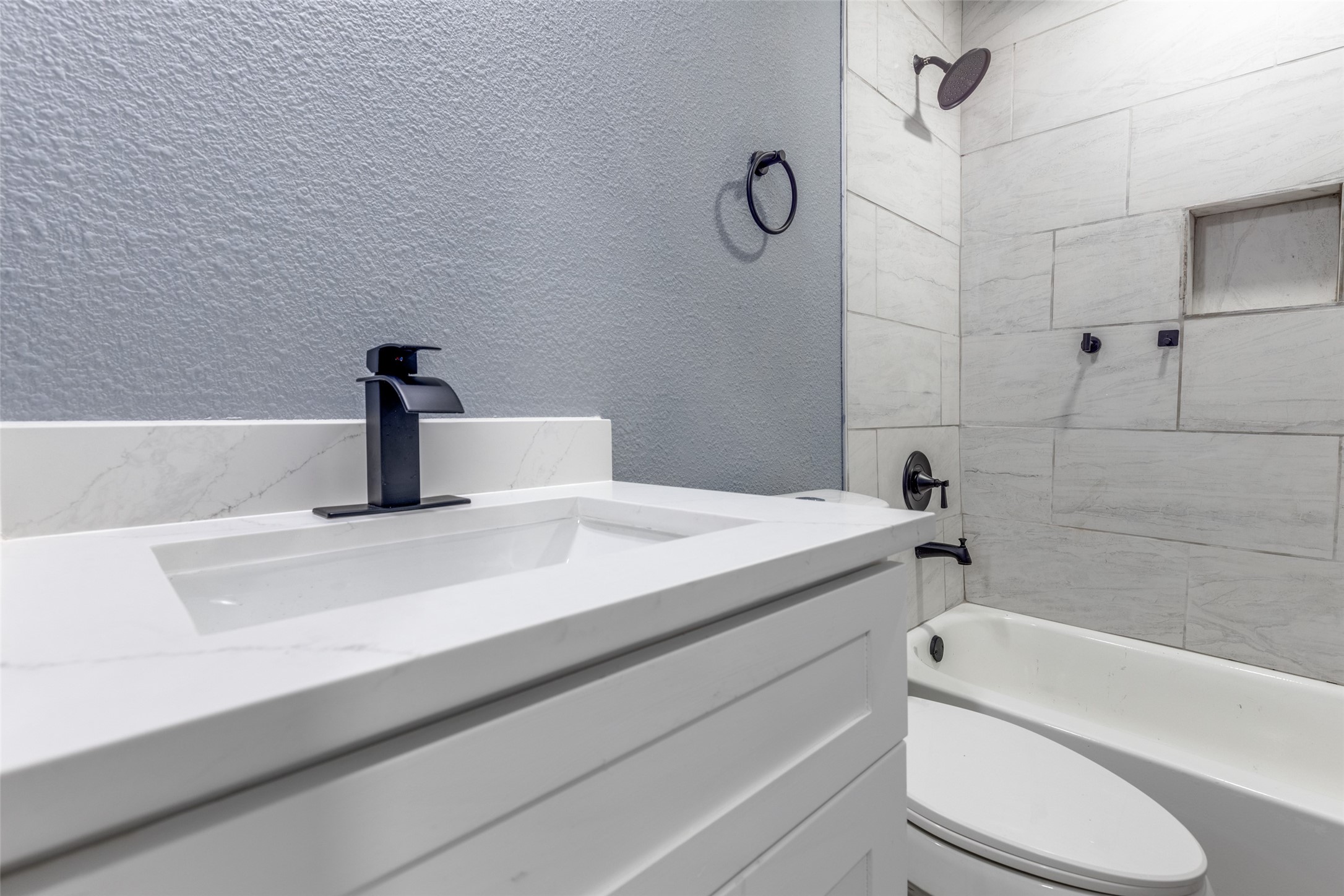 23115 Lestergate Drive Spring, TX 77373 - Photo 18 of 25 a bathroom with a sink a toilet and bathtub