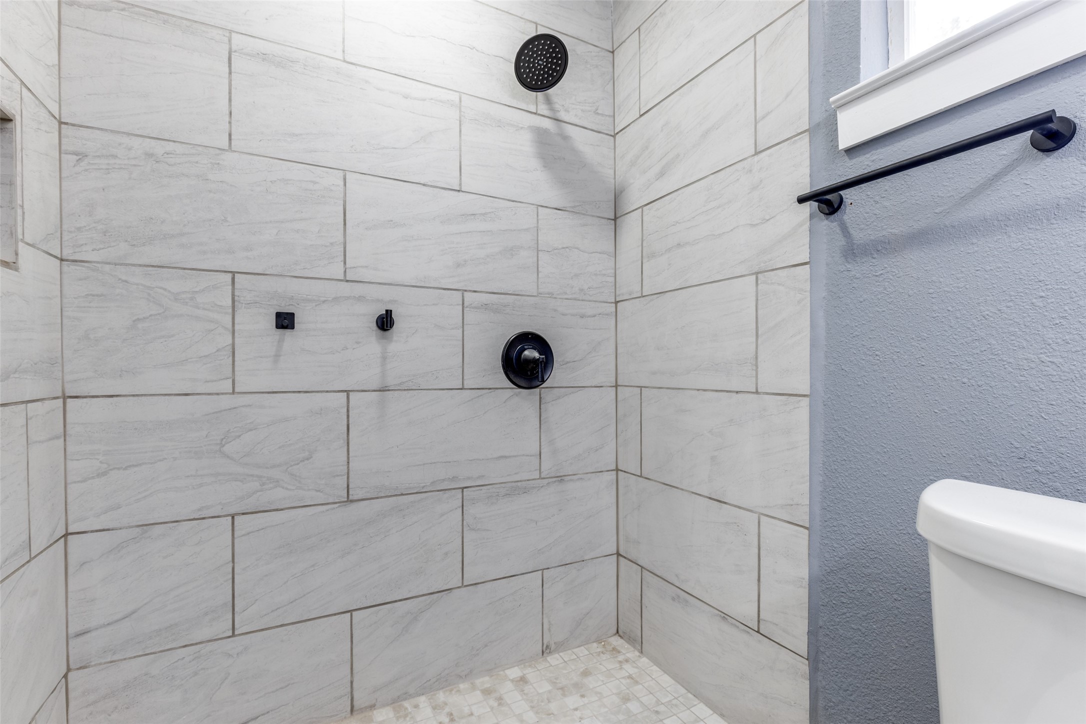 23115 Lestergate Drive Spring, TX 77373 - Photo 21 of 25 a bathroom with a shower