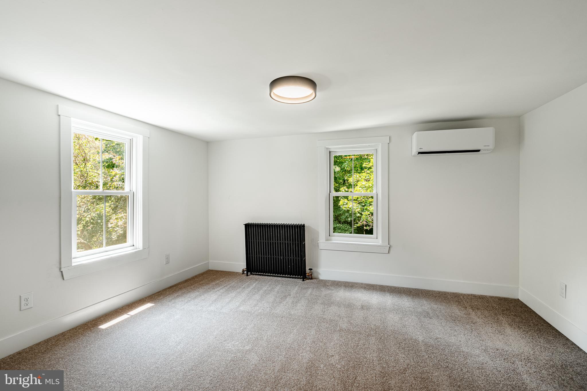 3661 St Peters Road Elverson, PA 19520 - Photo 19 of 36 an empty room with windows and closet