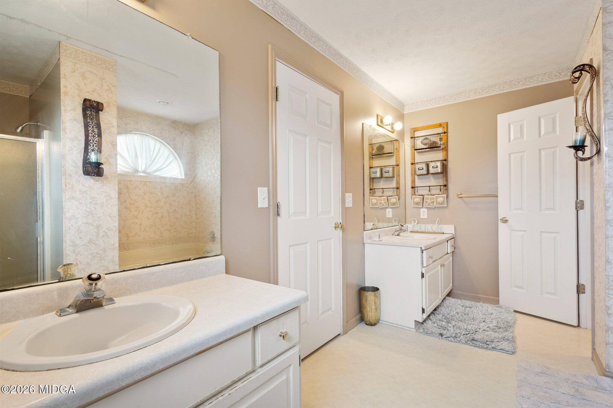 227 Dusty Lane Macon, GA 31211 - Photo 14 of 21 a bathroom with a sink and a mirror