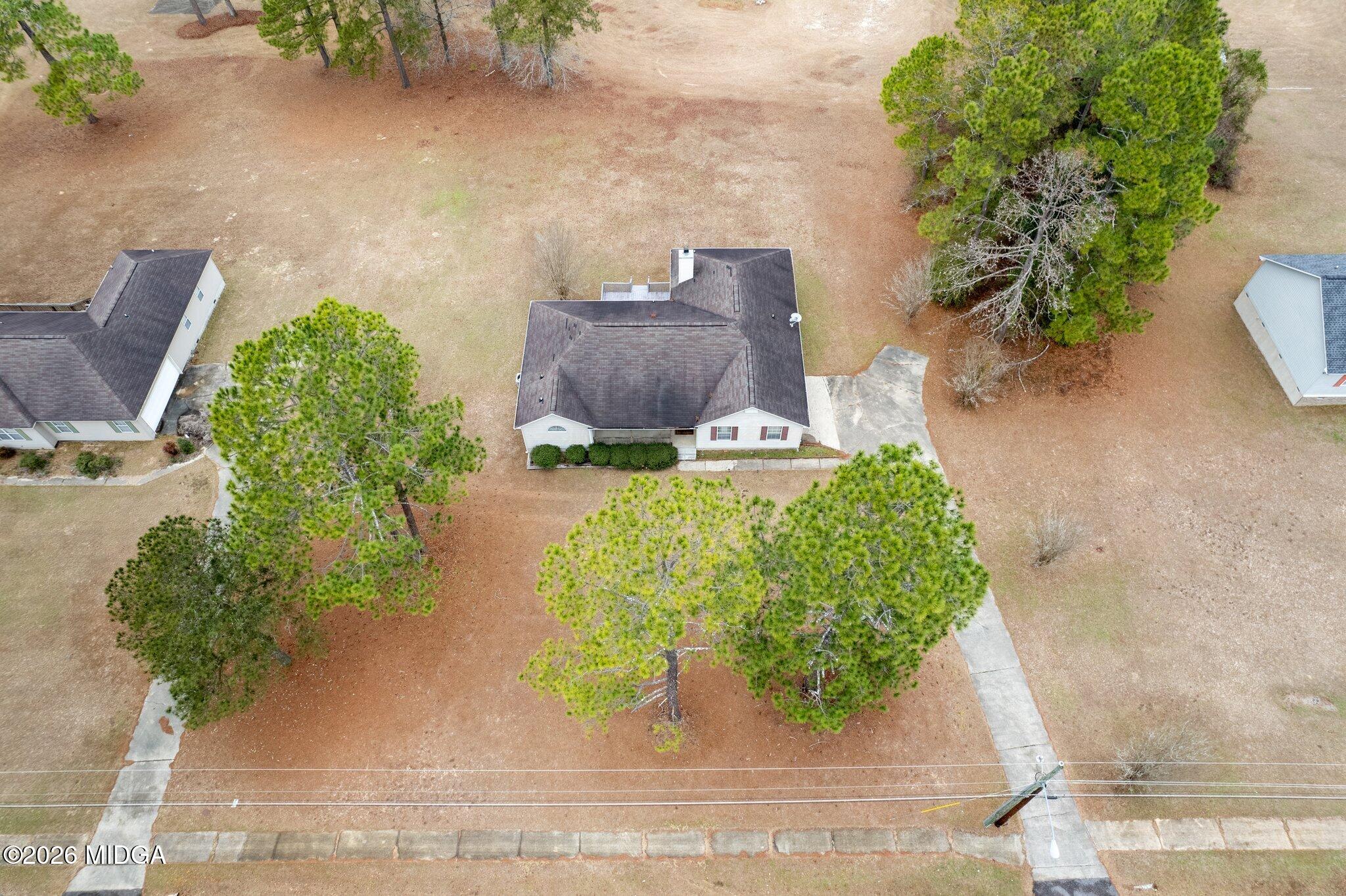 227 Dusty Lane Macon, GA 31211 - Photo 21 of 21 an aerial view of a house with a yard and garden