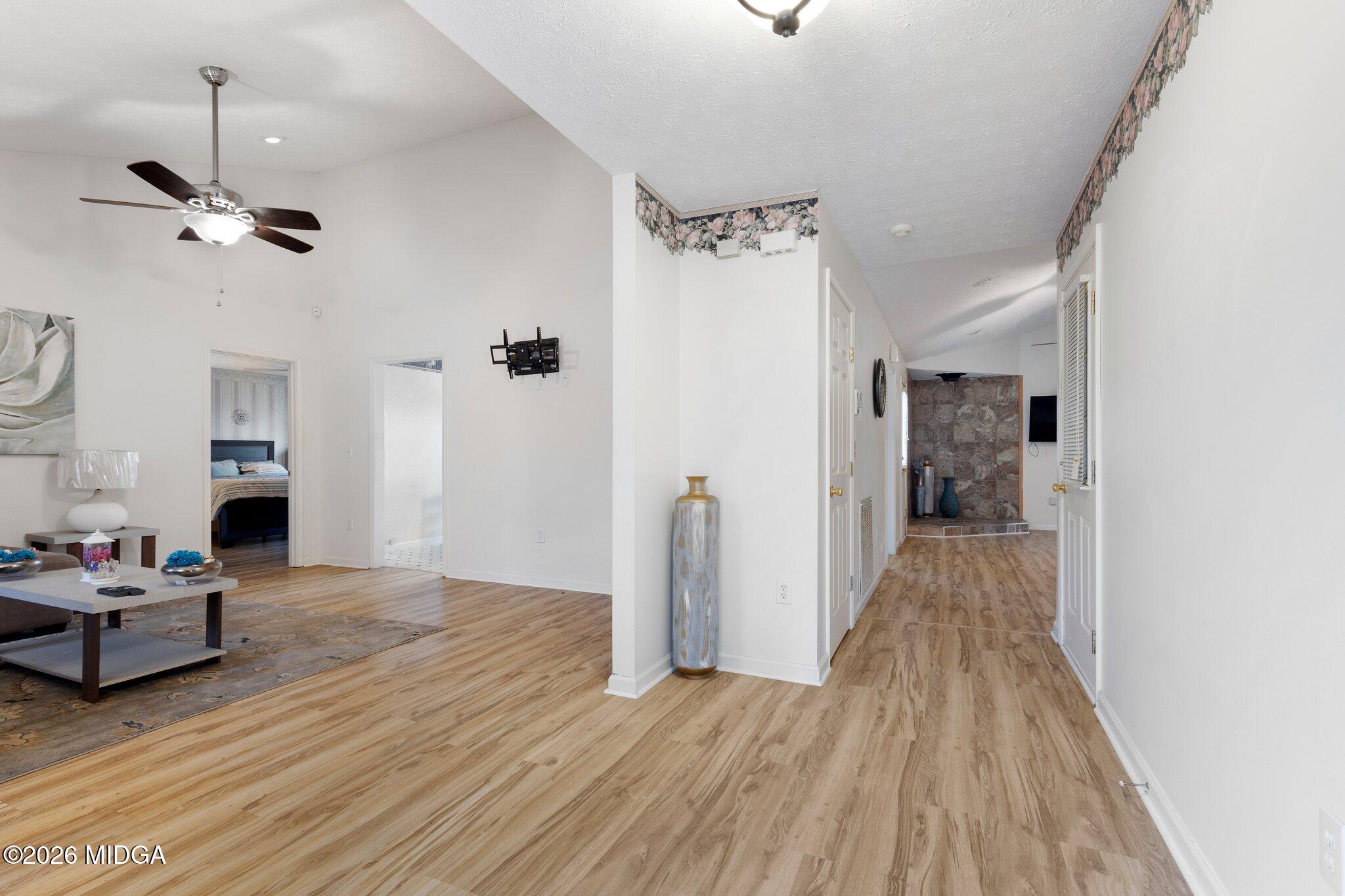 227 Dusty Lane Macon, GA 31211 - Photo 3 of 21 a living room with furniture and a wooden floor