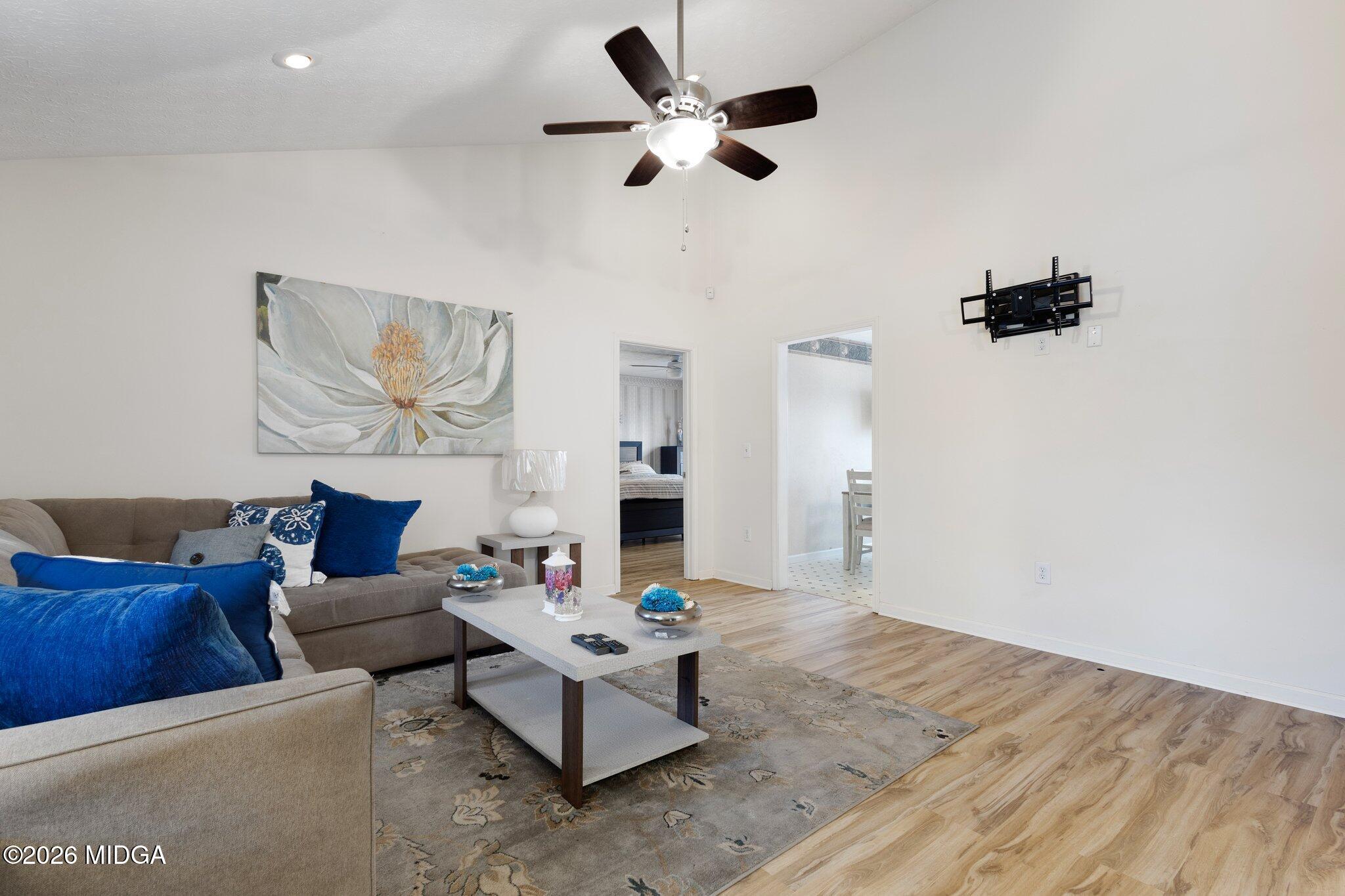 227 Dusty Lane Macon, GA 31211 - Photo 4 of 21 a living room with furniture and a wooden floor