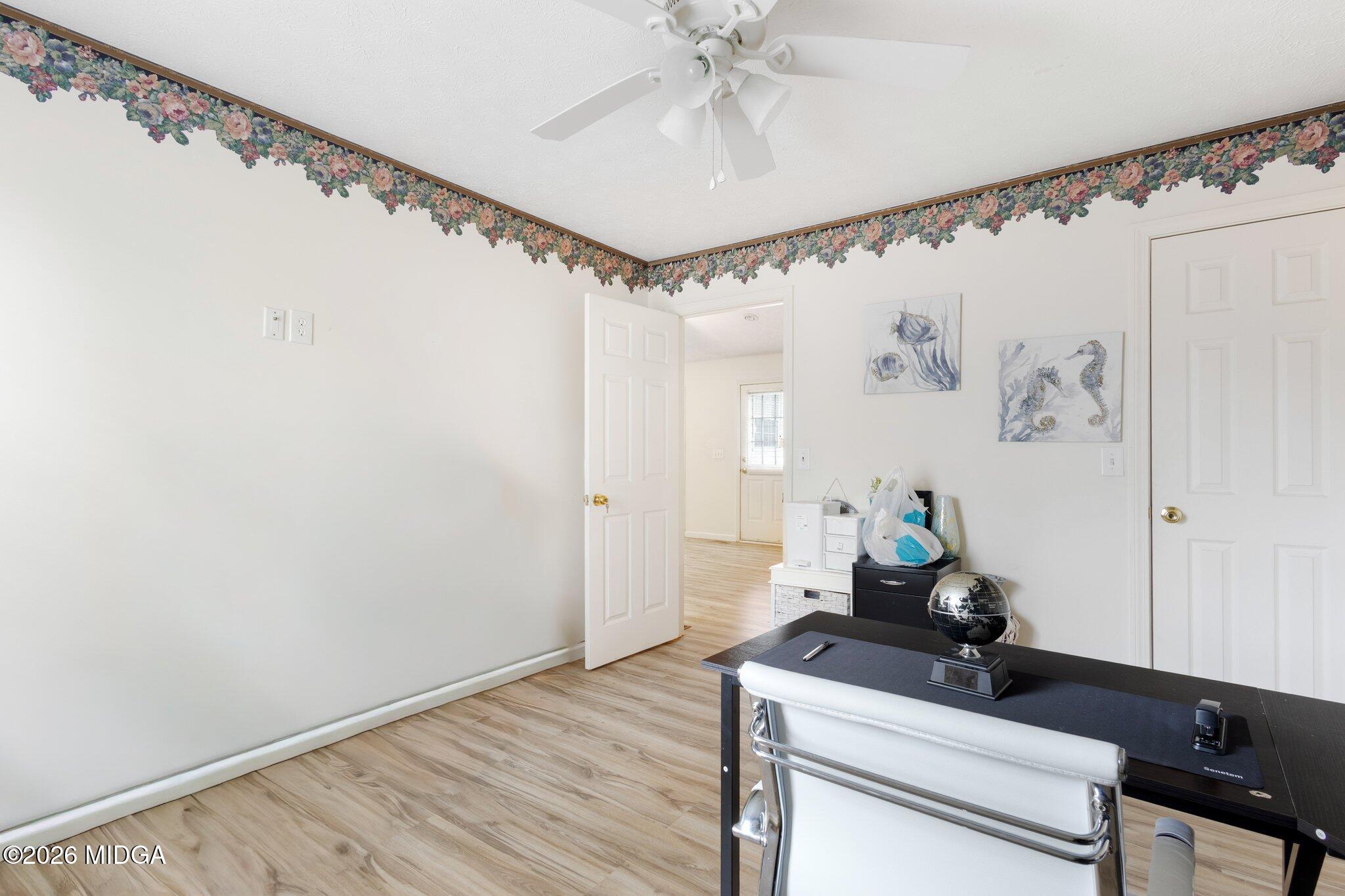 227 Dusty Lane Macon, GA 31211 - Photo 9 of 21 a room with a table and a chandelier