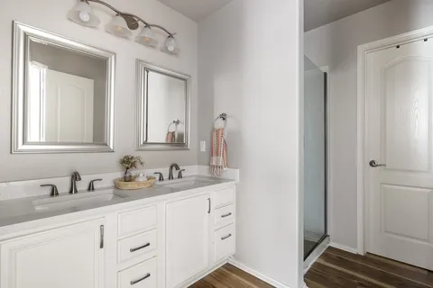 a bathroom with sink and mirror