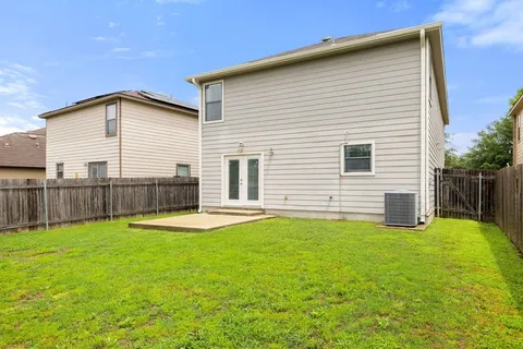 a view of a backyard with a garden
