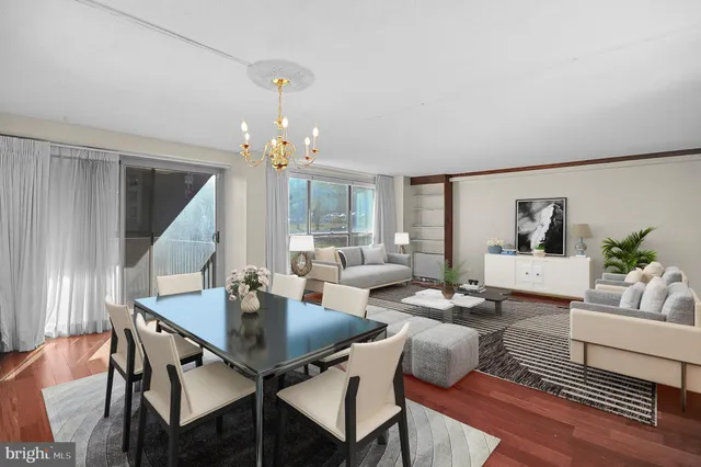 a view of an empty room with closet area